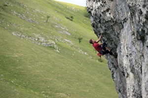Strength Prints: A climber scales a limestone cliff in Upper Wharfedale, Yorkshire Dales National Park