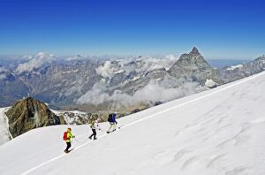 Images Dated 24th August 2011: Climbers on Breithorn mountain, with the Matterhorn in the background, Zermatt, Valais