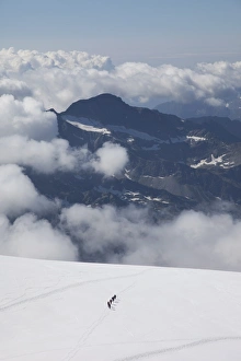Descending Prints: Climbers descending Monte Rosa, Italian Alps, Piedmont, Italy, Europe