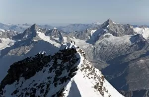 Climbers on the Lyskamm Peak in the Monte Rosa massif, Italian Alps, Piedmont