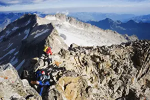 Climber Prints: Climbers on summit of Pico de Aneto, at 3404m the highest peak in the Pyrenees