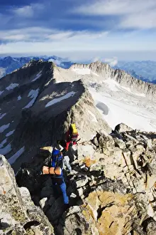 Climbers on summit of Pico de Aneto, at 3404m the highest peak in the Pyrenees
