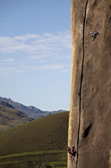 Images Dated 12th April 2008: Two climbers tackle a difficult route on a huge buttress on the Tsaranoro Massif