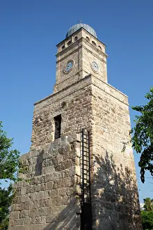 Antalya Prints: Clock tower built in 1901 stands tall against the blue sky in Antalya