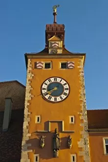 Clock tower on the end of the famous stone bridge, Regensburg, UNESCO World Heritage Site