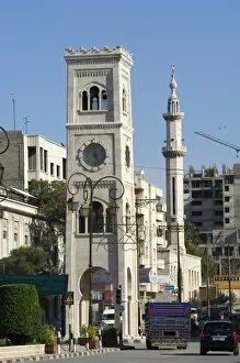 Images Dated 17th January 2000: Clock tower and mosque minaret