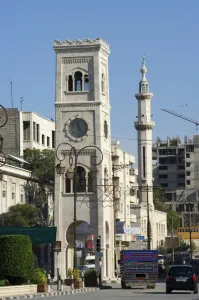 Images Dated 17th January 2000: Clock tower and mosque minaret