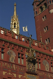 Basel Prints: Clock, wall paintings and bell tower on the Town Hall in Basle