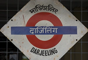 Bi Lingual Prints: Close up of a British style station sign at train station
