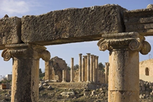 Jerash Prints: Close up of column tops with columns beyond