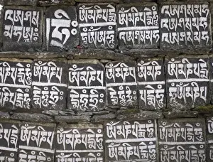 Writing Prints: Close up of Mani stones along one of the trekking trails in the Sagarmatha National Park