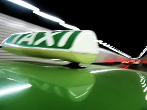 Text Prints: Close up of Taxi sign on car roof in tunnel, Shanghai, China, Asia