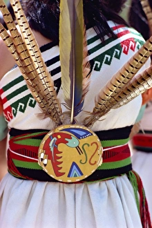 Costumes Prints: Close-up of the belt and feathers from the costume