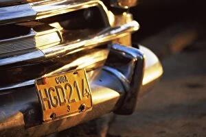 Images Dated 27th January 2000: Close-up of chrome bumper and yellow car number plate in morning light