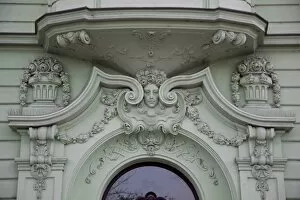 Close-up of decoration over doorway of a typical apartment building, Prague