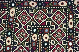 Embroidery Prints: Close-up of embroidery on a Gajj wedding dress