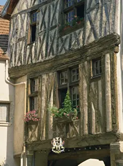 Bourgogne Prints: Close-up of exterior of a timber framed house in the village of Noyers sur Serein