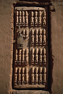 Dogon Prints: Close-up of granary door depicting ancestors of the Dogons, village in the Dogon area