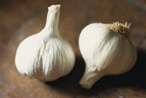 Close-up of two heads of garlic