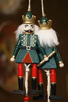 Bavaria Prints: Close-up of painted wooden figures at shop in the Christmas market in Munich winter