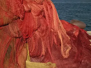Port Vendres Prints: Close-up of a pile of red fishing nets at Port Vendres in Languedoc Roussillon