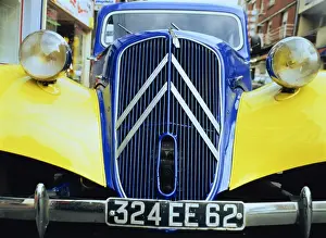 Grille Prints: Close-up of front radiator, number plate and lamps on a Citroen 4CV in France, Europe
