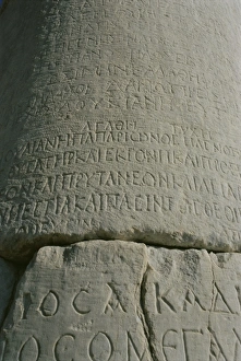 Carve Prints: Close-up of script carved in stone