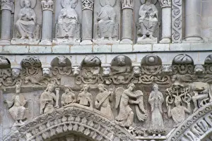 Poitou Charentes Prints: Close-up of sculptures including beasts and angels on the West Front of Eglise Notre Dame la Grande