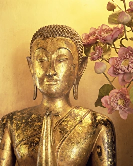 Gold Prints: Close-up of statue of the Buddha