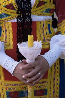 March Prints: Close-up of woman holding a candle