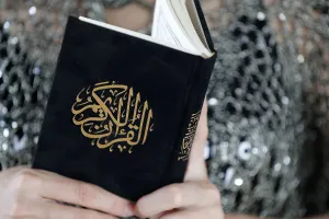 Silver Prints: Close-up of woman reading the Noble Quran, Ho Chi Minh City, Vietnam, Indochina