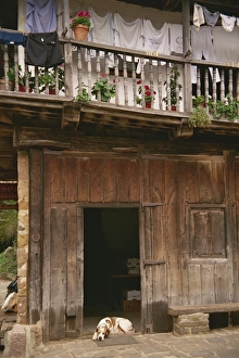 Cantabria Prints: Close-up of wooden doorway with a lucky horseshoe