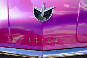 Vintage Car Prints: Close view of hood ornament and chrome fender on a classic vintage Buick, Havana, Cuba
