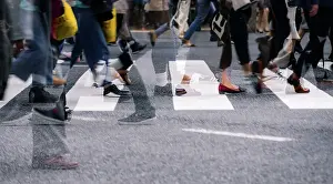Pedestrian Crossing Prints: Close up view of Shibuya Crossing with people crossing street in a multi exposure