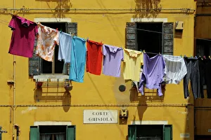 Customs Prints: Clothes hanging on a washing line between houses, Venice, UNESCO World Heritage Site