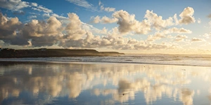 Cloud reflections at Constantine Bay at sunset, Cornwall, England, United Kingdom, Europe