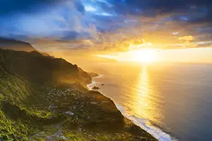 Pont Davignon Prints: Clouds over Arco de Sao Jorge and Ponta Delgada lit by the warm sunset, Atlantic Ocean