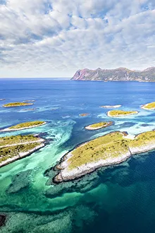 Senja Prints: Clouds over Bergsoyan Islands rocky islets in the blue sea, Hamn I Senja, Skaland, Senja