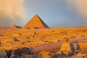 Mystical Prints: Clouds at dawn over The Sphinx and Giza pyramids, Cairo, Egypt