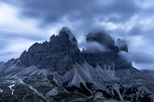 Dolomites Gallery: Clouds at dusk in the foggy sky over Tre Cime di Lavaredo mountain peaks, Dolomites, South Tyrol
