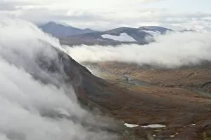 Images Dated 11th September 2009: Clouds and mountains and tundra in the fall, Katmai Peninsula, Alaska, United States of America