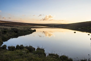 Malawi Prints: Clouds reflecting in a little lake at sunset, Nyika National Park, Malawi, Africa