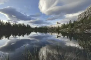 Mountain Ranges Prints: Clouds at sunrise over Rifugio Croda da Lago and Becco di Mezzodi reflected in Lake