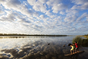 Clouds at sunset, Pangalanes Lakes canal system, Tamatave, eastern area, Madagascar