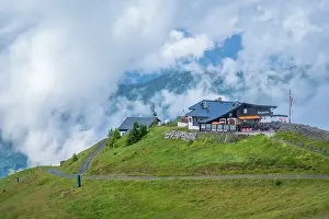 Enjoyment Prints: Clouds surround Hochzeller-Alm at 1959m with view from Schmittenhohebahn top station near Zell am See in Austria