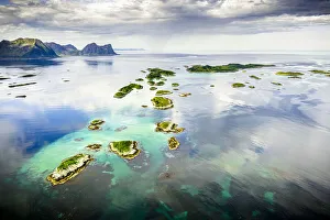 Senja Prints: Cloudy sky over Bergsoyan Islands in the clear water of the fjord, Hamn I Senja, Skaland