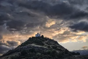 Thessaly Prints: Cloudy sunset on a small church on the top of a hill, Thessaly, Greece, Europe