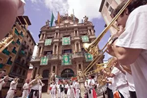 Clubs parade, San Fermin festival, and City Hall building, Pamplona, Navarra