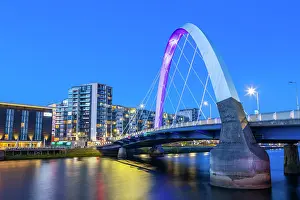 Clyde Prints: Clyde Arc bridge spans River Clyde at night in Glasgow