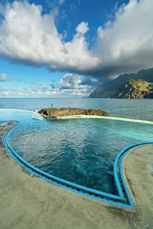 Concrete Prints: Coastal swimming pools near mountains at Porto da Cruz